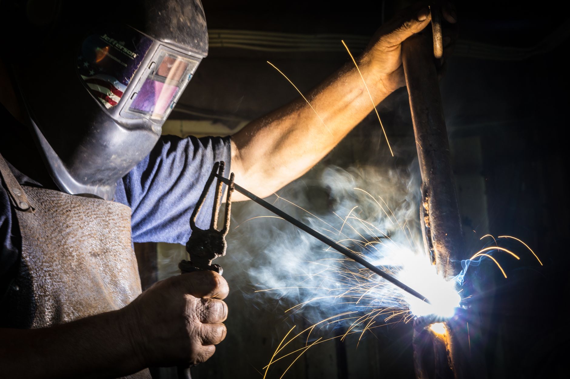Welding sparks in an industrial shop